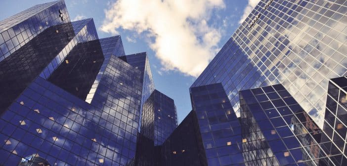 low angle photo of curtain wall building